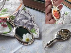 a spoon with a flower on it sitting next to a pocket mirror