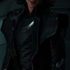 an image of a man in black leather outfit