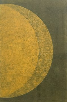 an abstract painting with two circles in yellow and green colors on a black background that appears to be half - circle