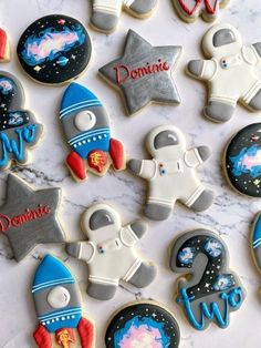 some cookies are decorated with space related items