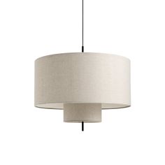 a white lamp hanging from a ceiling with a light shade on it's side