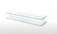 a glass shelf sitting on top of a white surface