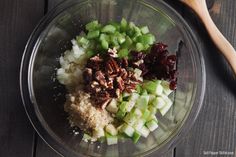 chopped vegetables and nuts in a glass bowl