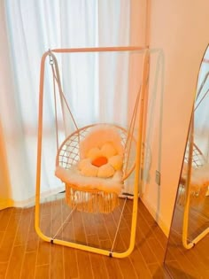 a chair that is sitting in the middle of a room with two mirrors behind it