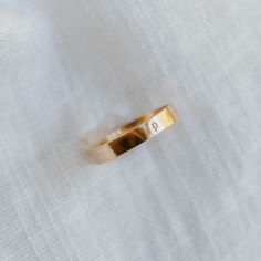 Sleek, minimal, bold. The Infinity Band adds the perfect thickness to any ring stack. Personalize it with an initial! - Made with 14k gold filled or sterling silver material - Rectangle band, 3x1mm thick - Hand-stamped with a san serif lowercase letter (1.5mm) Please note: You may experience a slight color difference in places where the metal has been soldered making every piece truly unique. If you do not see your size, reach out to us by email at info@hellorising.com. We believe that everyone Minimalist Gold Stackable Bands, Minimalist Stackable Gold Bands, Simple Stackable Initial Ring For Everyday, Adjustable Simple Initial Ring For Everyday, Minimalist Open Band Midi Ring For Promise, Everyday Stackable Midi Rings With Thick Band, Simple Gold Bands For Everyday, Everyday Stackable Thick Band Midi Rings, Stackable Thick Band Midi Rings For Everyday