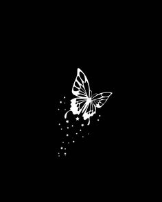 a black and white photo of a butterfly flying in the sky with stars around it