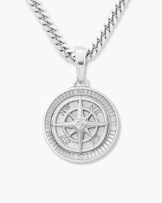 Forge your own path with our silver Compass Pendant. A single CZ stone sits in the middle of this silver men's pendant. Pair with a rope chain for an adventurous look or with a Cuban chain for a classic reminder of your journey ahead. Compass Pendant, Solid Gold Chains, Mens Pendant, Silver Shop, Cuban Link Chain, Cuban Chain, Men's Rings, Silver Man, Rope Chain