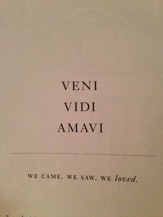 an open book with the words veni vidi amavi written in black on it