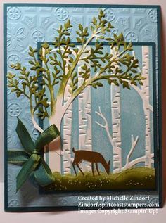 a handmade card with a deer in the woods on it's front and back