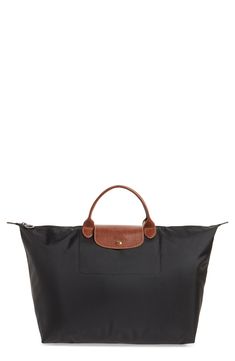 Longchamp 'Le Pliage' Overnighter | Nordstrom Longchamp Small Le Pliage, Leather Handles, Folded Up, Longchamp Le Pliage, Easy Storage, Leather Handle, Embossed Leather, Travel Bag, Snap Closure