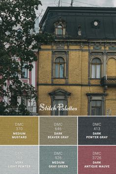 an old building with many windows and balconies on the top floor in different colors