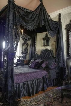 the canopy bed is decorated in black and purple