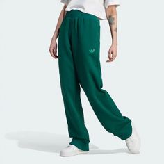 ROOMY JOGGERS WITH HELLO KITTY DETAILS EMBROIDERED HERE AND THERE Adidas Sweats, Green Adidas, Adidas Joggers, Model Call, White Sneakers Women, Adidas Sportswear, Swimwear Shorts, Stella Mccartney Adidas, Wide Legs