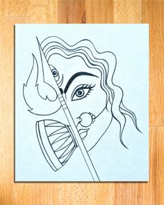 a drawing of a woman's face with a burning match in her mouth on top of a piece of paper