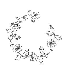 a black and white drawing of leaves and flowers in the shape of a circle on a white background