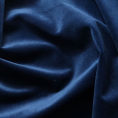 a close up view of a blue fabric