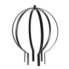 a metal sculpture with black ribbons hanging from it's sides and an object in the middle