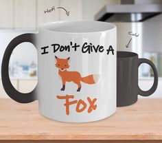 a coffee mug that says i don't give a fox on the front and back