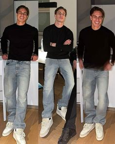 three men in black shirts and jeans standing next to each other