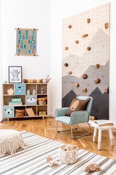 a child's room with climbing walls and toys