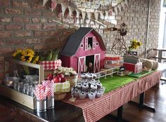 a farm themed birthday party with cupcakes and cake