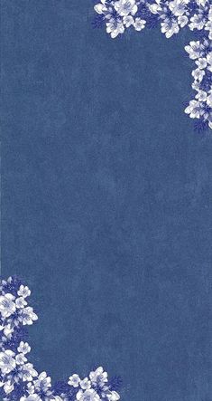 a blue background with white flowers on the bottom and an empty space in the middle