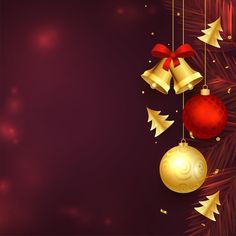 christmas decorations hanging from the branches of a tree with red and gold balls on it