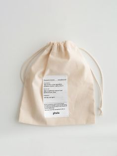 a white bag with a label on it