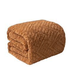 the brown blanket is folded on top of each other, and it's made out of