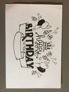 a birthday card with the words happy birthday written in black and white on top of it