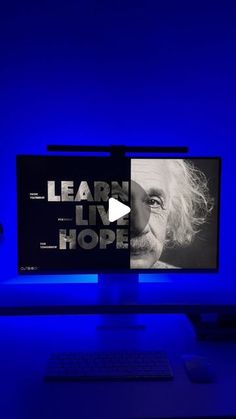 a desktop computer sitting on top of a desk next to a keyboard and monitor with the words learn live hope