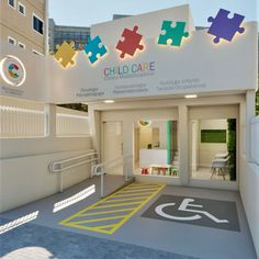 the entrance to a children's hospital with puzzle pieces on it