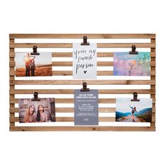 a wooden frame with photos hanging on it and some magnets attached to the board