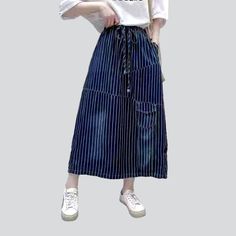 Be the envy of everyone in the 2023 Spring-Summer Collection with this stylish long denim skirt! With its distinctive vertical stripes and high-waisted fit. this skirt is sure to make a statement. Featuring a drawstrings closure. it's the perfect combination of comfort and flair. Whether you're headed to a music festival or a laid-back day out with friends. this skirt will become the crowning jewel of your outfit!Key Highlights: Street Style: This skirt is the perfect blend of contemporary fashi Blue Drawstring Skirt For Spring, Casual Striped Skirt, Striped Summer Skirt, Cotton Long Skirt With Drawstring, High Waist Striped Skirt For Summer, Relaxed Striped Skirt For Spring, Striped Skirt With Pockets For Summer, Striped Long Skirt For Spring, Spring Blue Drawstring Skirt