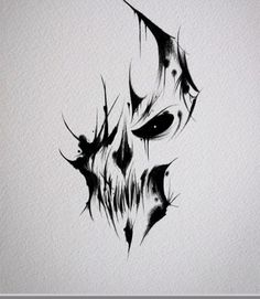 a black and white drawing of a demon's head