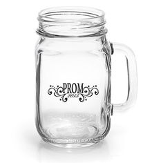 a glass mug with the word prom written on it's front and side rim