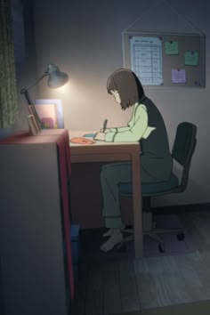 a person sitting at a desk writing on a piece of paper in front of a lamp