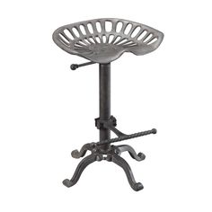 a metal stool with an adjustable seat and foot rests on a cast iron base, against a white background