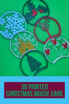 christmas ornaments made out of cookie cutters on a green background