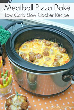 a slow cooker with meatball pizza bake in it