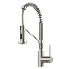 the kitchen faucet has an adjustable pull out sprayer and is stainless steel