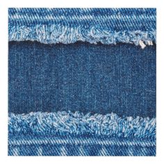 an image of blue jeans with torn edges