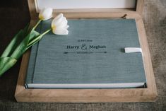 a wedding album with two tulips in it