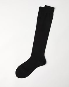 Cotton socks The classic rib knitting of pure cotton yarn gives this accessory a sophisticated touch. Naturally breathable, the cotton fibers ensure comfort and lightness. Elegant Black Knee-high Socks, Classic Stretch Knee-high Socks, Elegant Formal Stretch Socks, Black Stretch Classic Knee-high Socks, Classic Black Stretch Knee-high Socks, Formal Black Stretch Socks, Classic Black Knee-high Socks, Modern Fitted Black Socks, Black Fitted Classic Socks