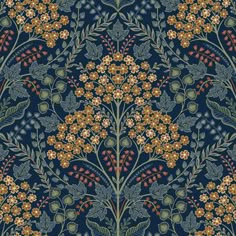 a blue and yellow floral wallpaper with small flowers on the bottom half of it