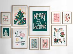 a group of christmas cards hanging on the wall