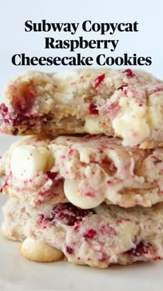 three cookies stacked on top of each other with white chocolate chips and cranberries