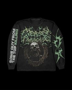 a black long sleeve shirt with green and white writing on the sleeves, featuring an image of