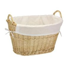 a wicker basket with white lining