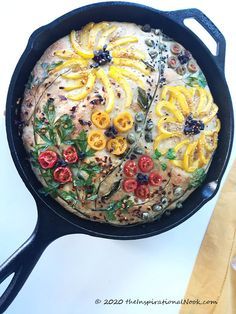 a pan filled with food sitting on top of a table